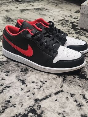 Nike Air Jordan 1 Low in the 'White Toe' colorway, Fire Red Mens 11.5